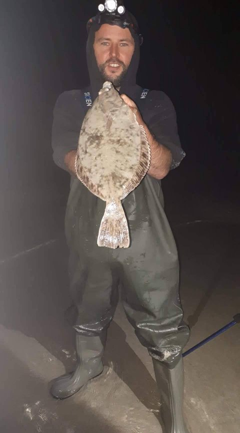 Christopher with a 41cm flounder